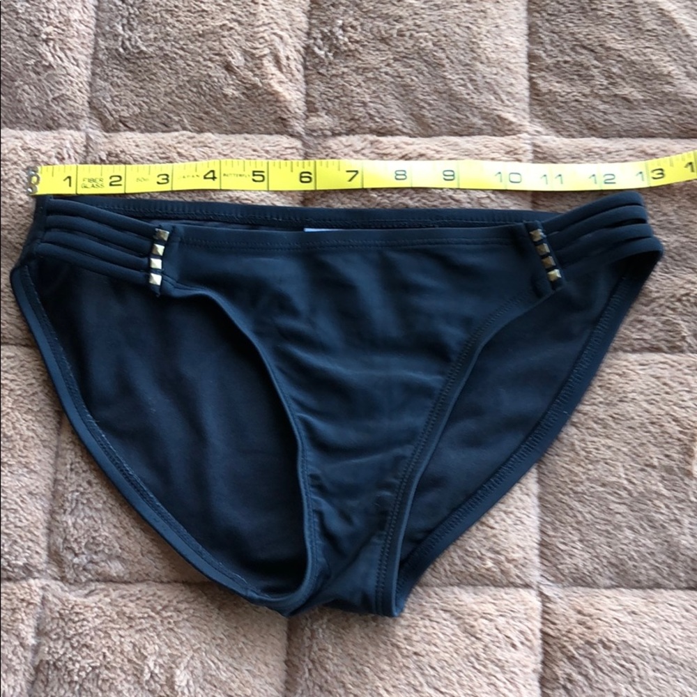 Black bikini bottoms with side straps